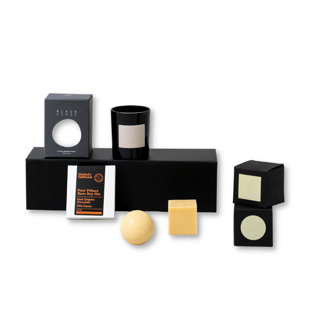 Black Blaze candle , Hunted + Gathered Four Pillars chocolate and De Chalain soaps